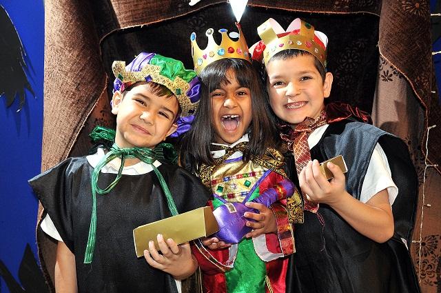 Mohammed Hasan Kalam, Naeem Gul and Iqra Hussain all six, are the Three Kings in The Christmas Recipe at Byron Primary school, Bradford