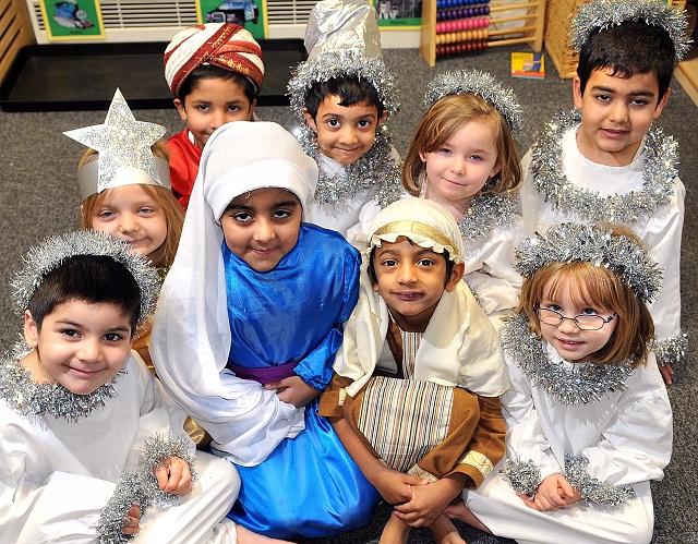Mary, Joseph and some angels in The Hoity Toity Angel at Crossley Hall Primary School, Fairweather Green, Bradford