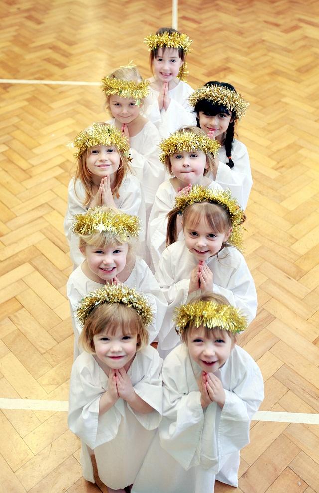 Angelic pupils from Greatwood Primary School, Skipton, (from back to front) Phoebe Burkinshaw, Olive Mitton, Lily-Rose Kirk, Lucy Carberry, Kayleigh Atkinson, Ashlea Hird, Hannah Robinson, Betty McKibben and Lily Smith