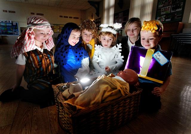 Elliot Ideson, Rhianna Pickles, Alfie Price, Lily Adiller, Nichole Arnold and Rhuban Timmins view the Nativity scene at Christ Church Primary School in Skipton