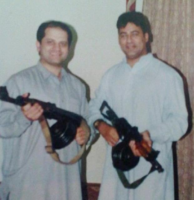 Asif Khan &#40;right) pictured ten years ago in Afghanistan on an aid mission