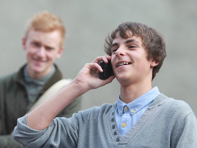 Pupils collect their GCSE results at Ermysteds Grammar School, Skipton - Harry White phones home after getting his results