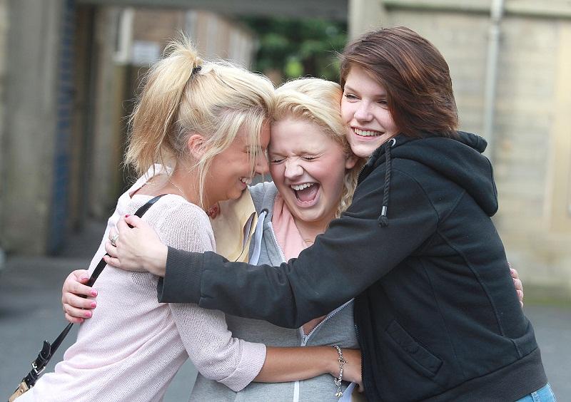 Pupils collect their GCSE results at Aireville School, Skipton - Hugs all round for Hannah Hodgson, Mel Pitfield and Erin Horsman