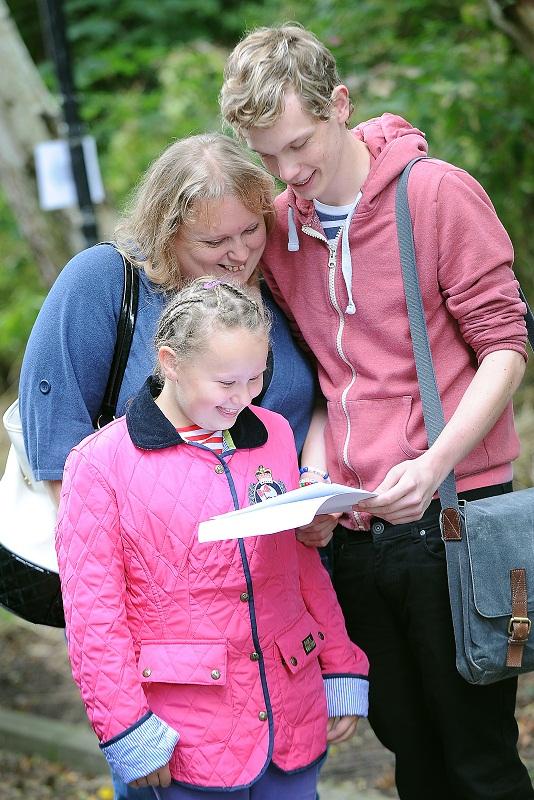 David McIntyre shares his GCSE results with mum, Samantha and sister Leanne, at Challenge College
