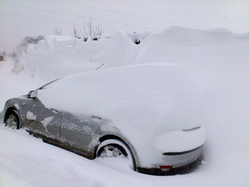 Reader Nigel Pearson's Car, on Bank Lane, Riddlesden. Snow drifts of up to ten foot cut Nigel and his family off from civilisation.