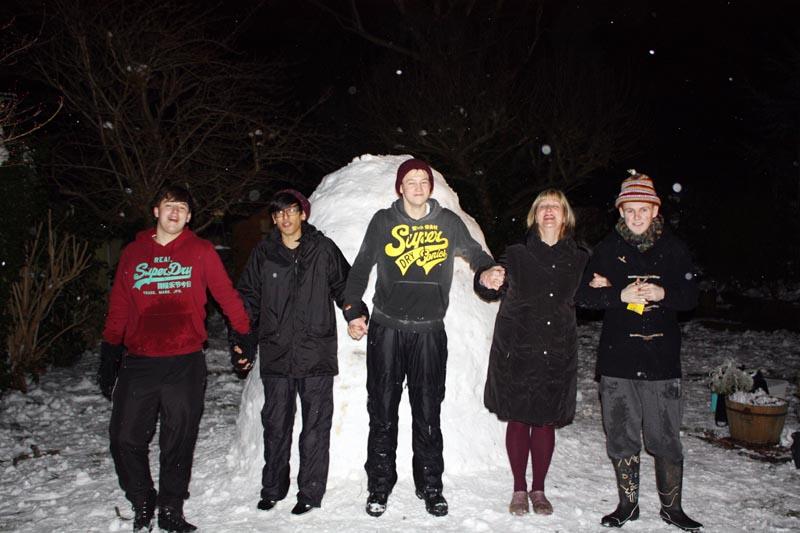Reader Leo Patterson and his friends with the igloo they built. It took them five and a half hours to construct, it is 210cm and there is enough room for four people inside