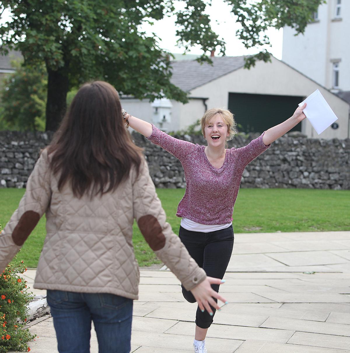 Shannon Graham  (1A*, 4As and 2Bs ) skips with joy at Upper Wharfedale School