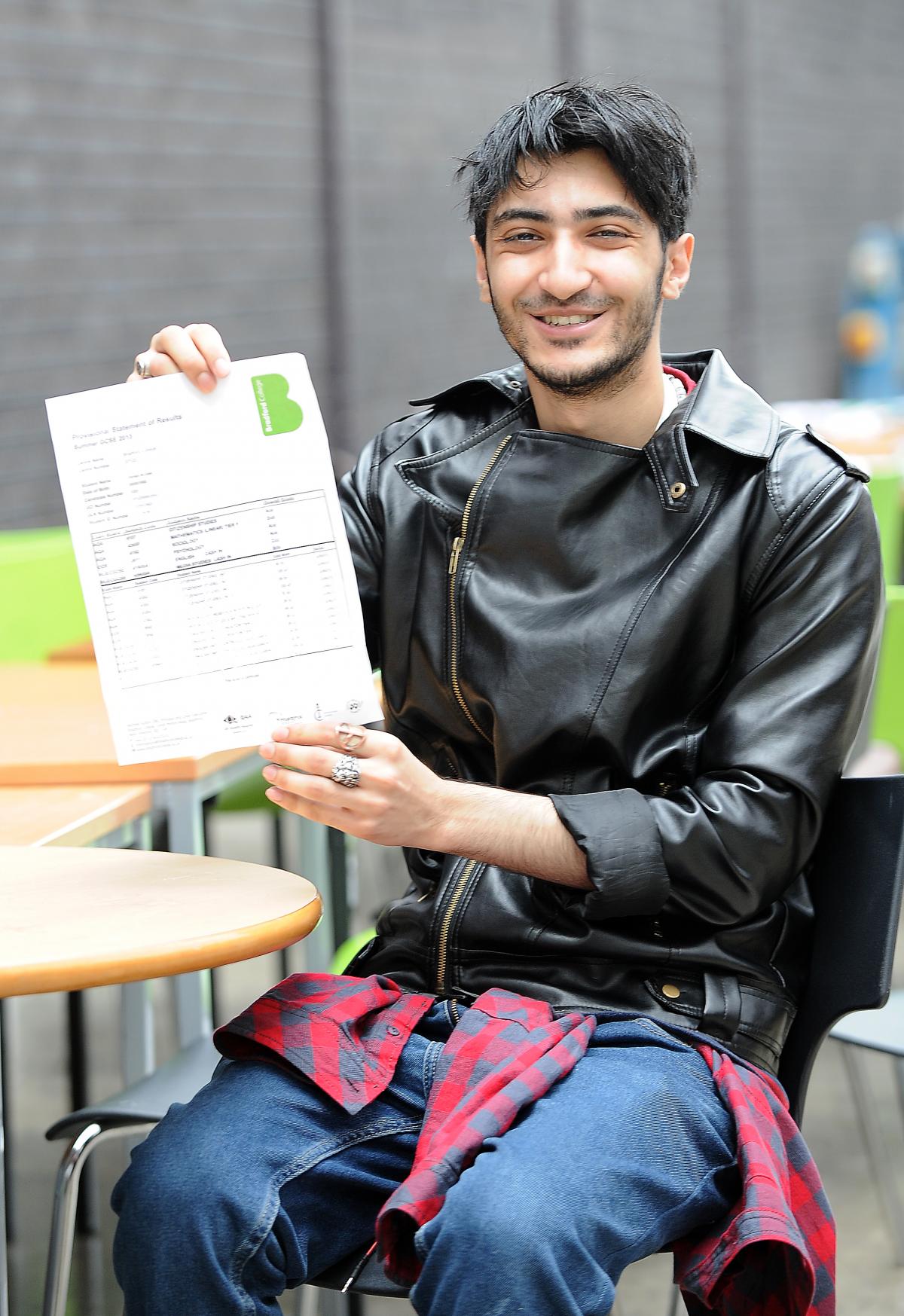 Osman Deen with his GCSE results at Bradford College