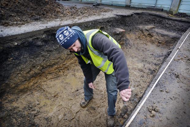Bradford Telegraph and Argus: Site officer James Stanley in one of the trenches
