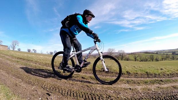 Bradford Telegraph and Argus: Iain Johnson, who will run cycling activity on the moors above Keighley, out on his mountain bike