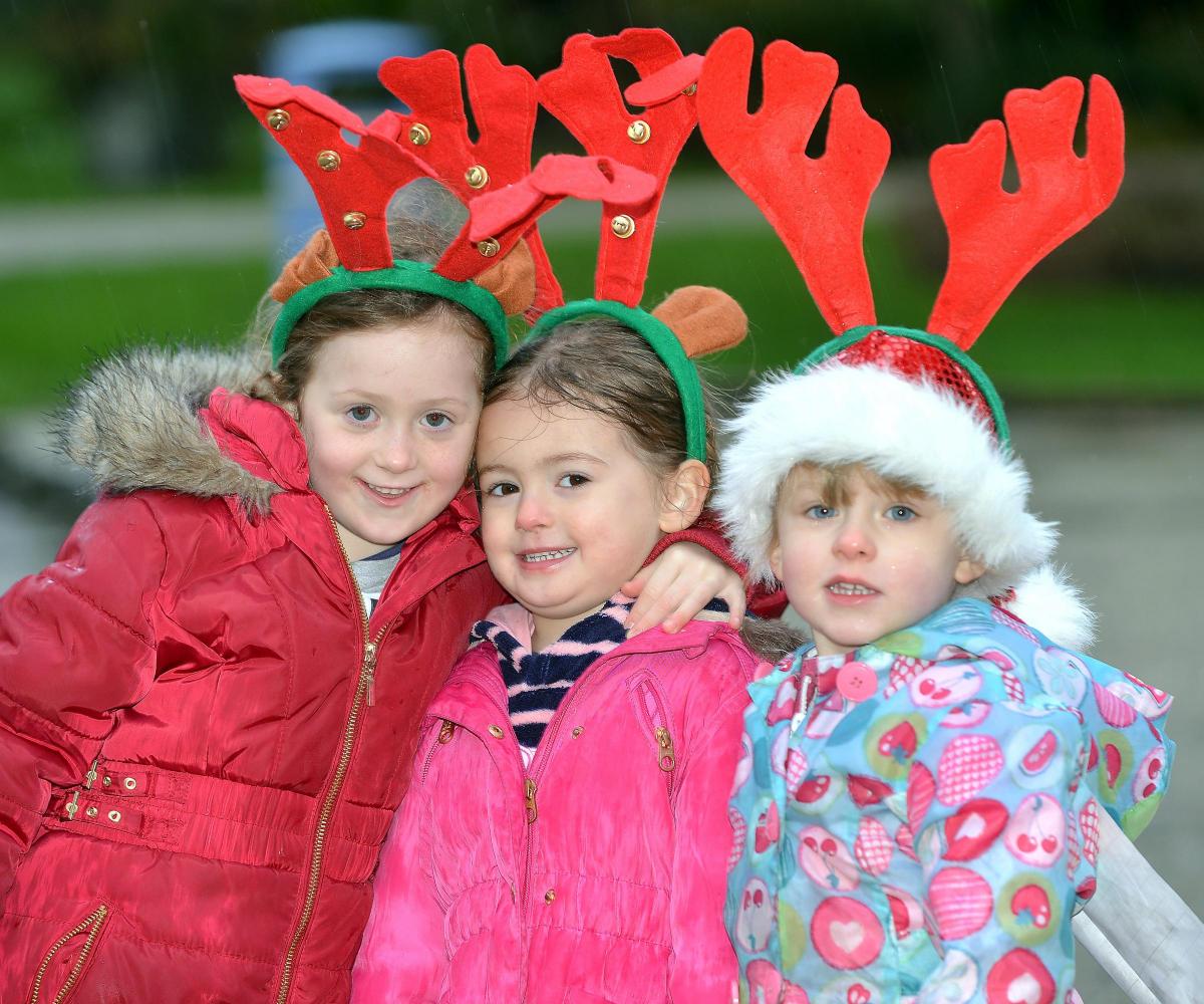 Lola Mann, six, Lois Payne, four, and Edie Corbett, three, from Eldwick enjoying the reindeer run