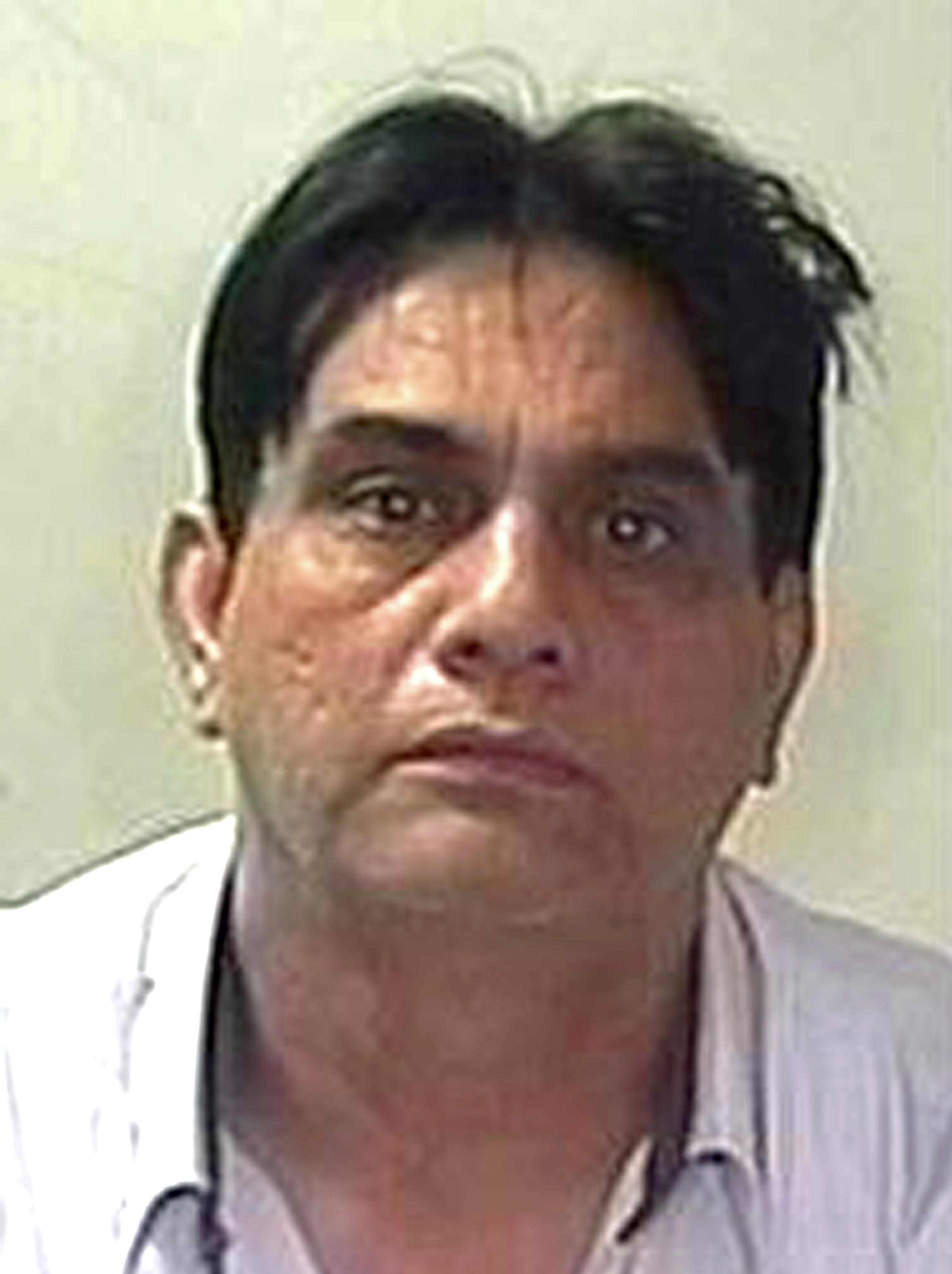JAILED: <b>Mohammed Akhtar</b> who helped his son flee - 3499090