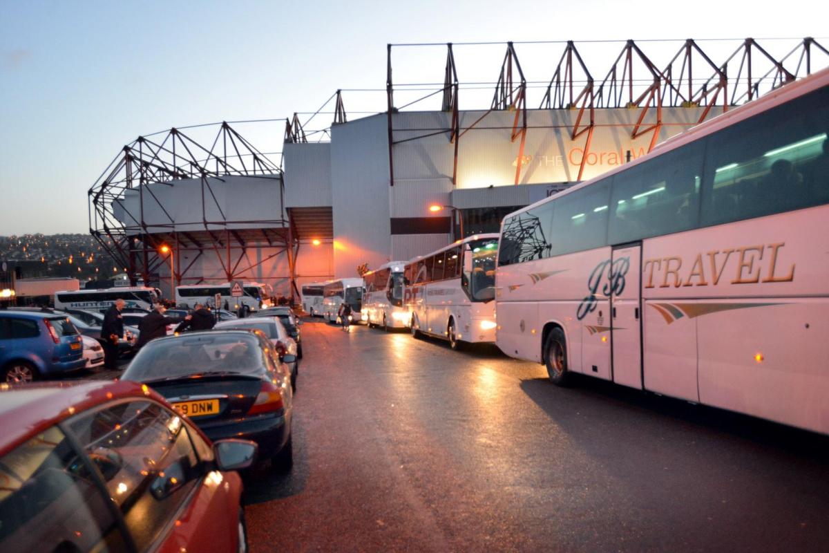 Coaches ready to leave Valley Parade on Saturday morning for the journey to London