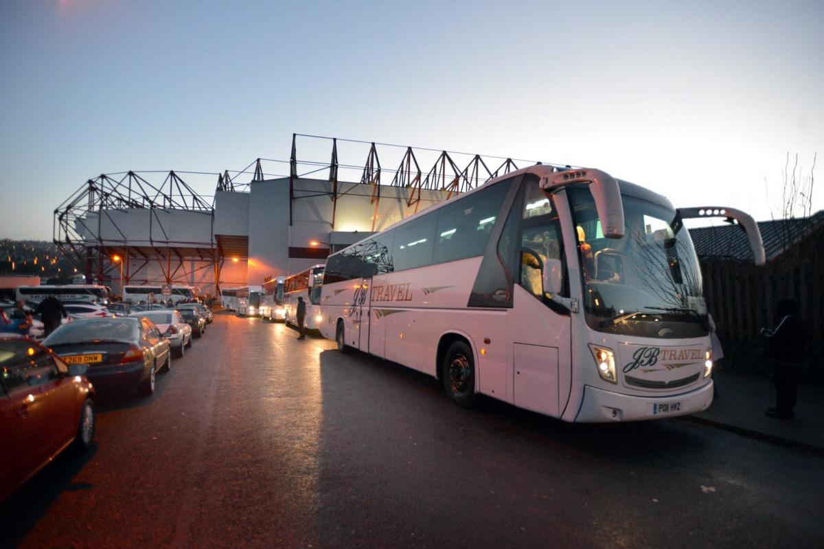 Coaches ready to leave Valley Parade on Saturday morning for the journey to London