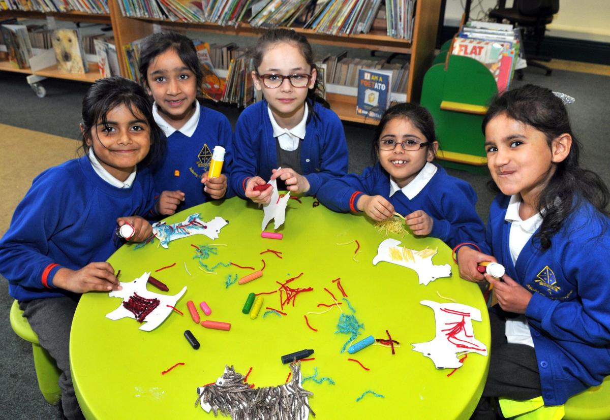Keighley Library celebrates World Book Day with children from Victoria Primary School. Enjoying a craft session are from left, Haaniah Hussain, 6, Zikra Bi, 7, Alenah Hussain, 7, Meher Unisa, 6, Mawwa Hussain, 7