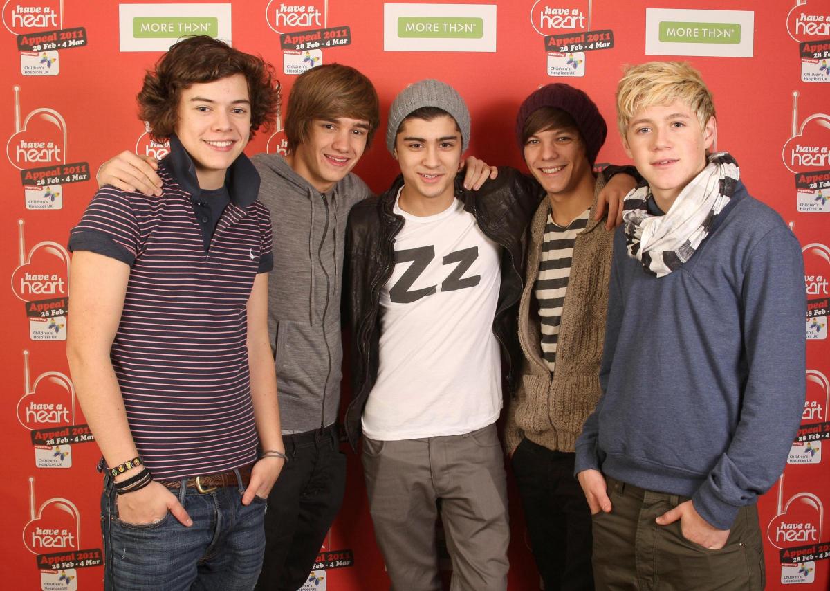 Zayn (centre) with One Direction's Harry Styles, Liam Payne Louis Tomlinson and Niall Horan in 2011