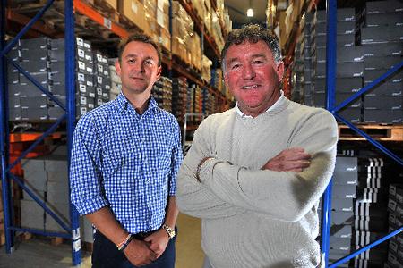 RECOGNITION: From left, Brett Bannister, managing director of SportsShoes.com, pictured with founder Bruce Bannister, says he is delighted to make the Investec Mid-Market 100 list