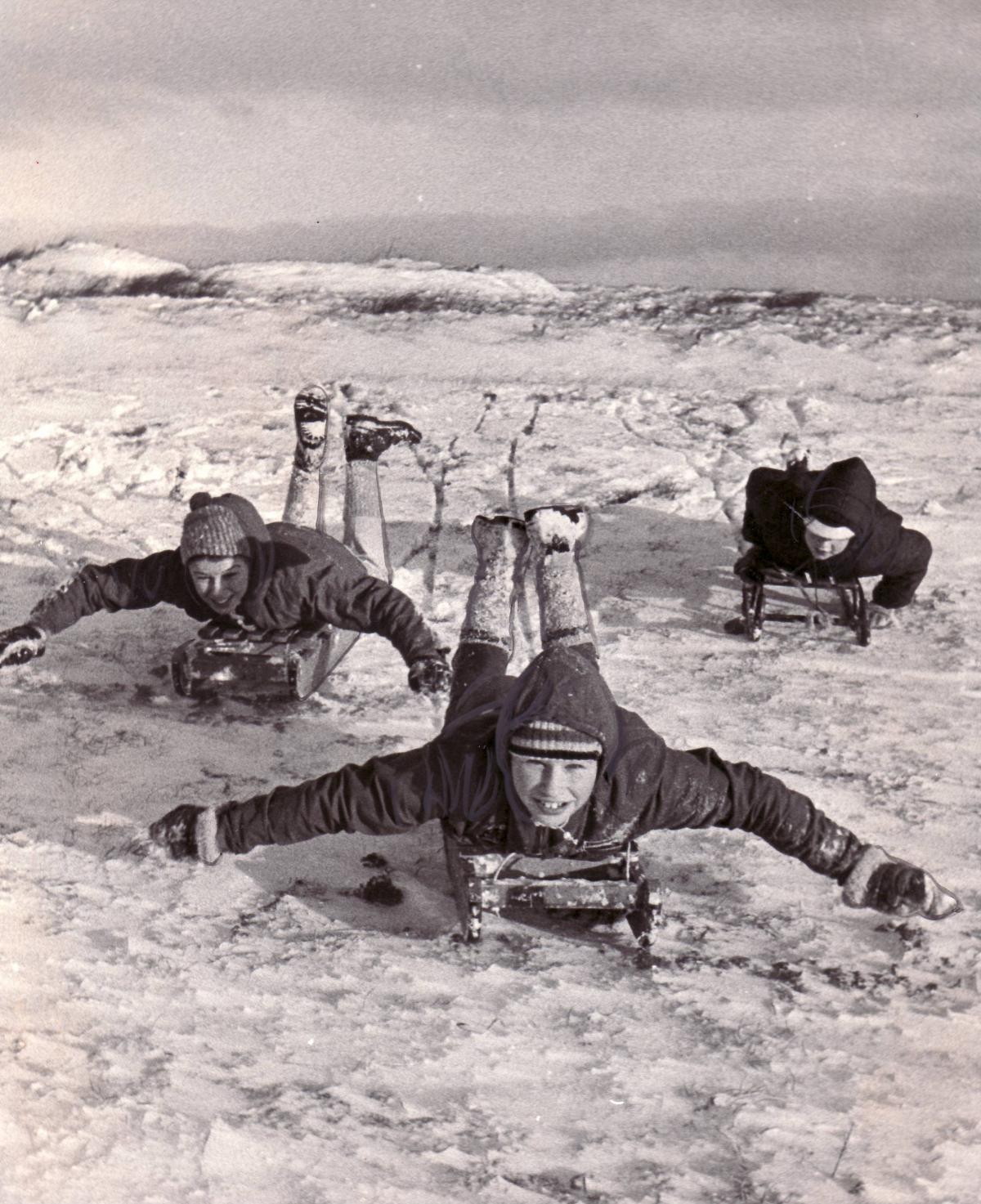 People have fun in the snow in 1970 on Baildon Moor