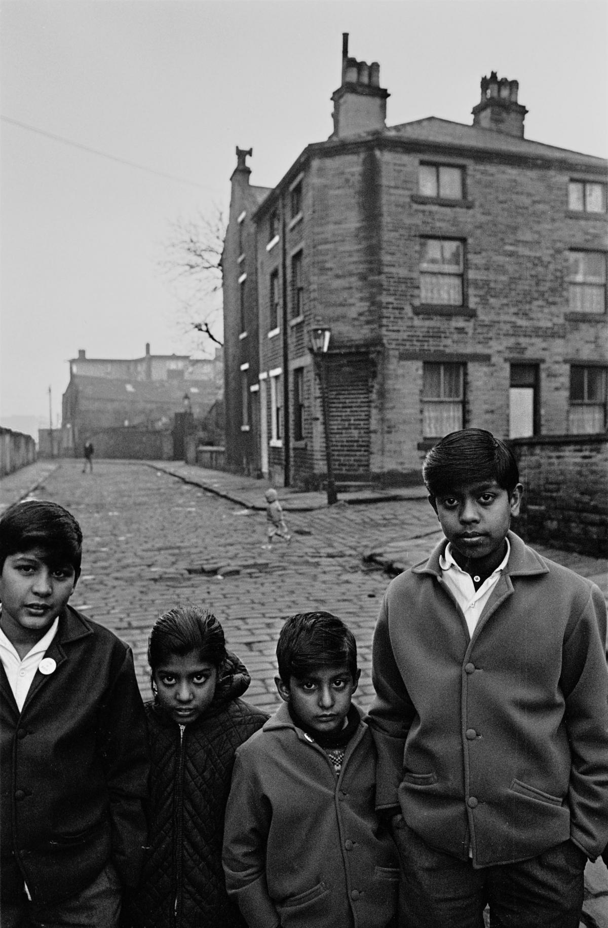 A group of schoolchildren on their way home after a day at school in Bradford