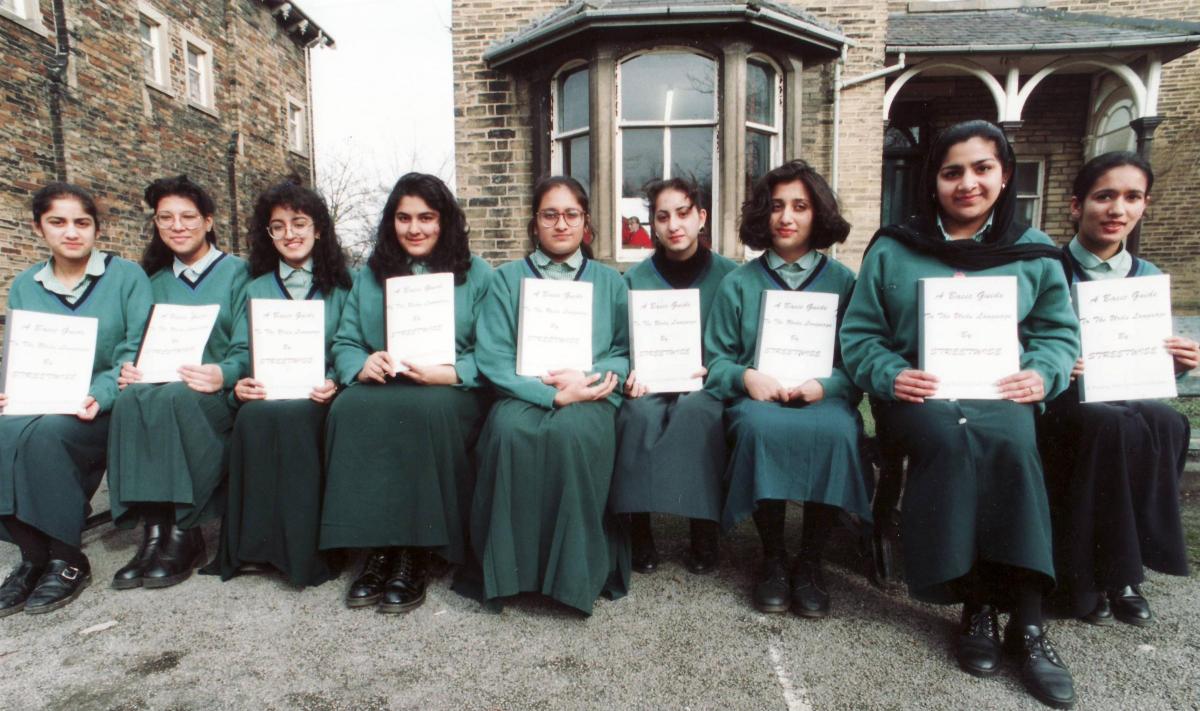 St Joseph's College pupils with Urdu booklets in 1994