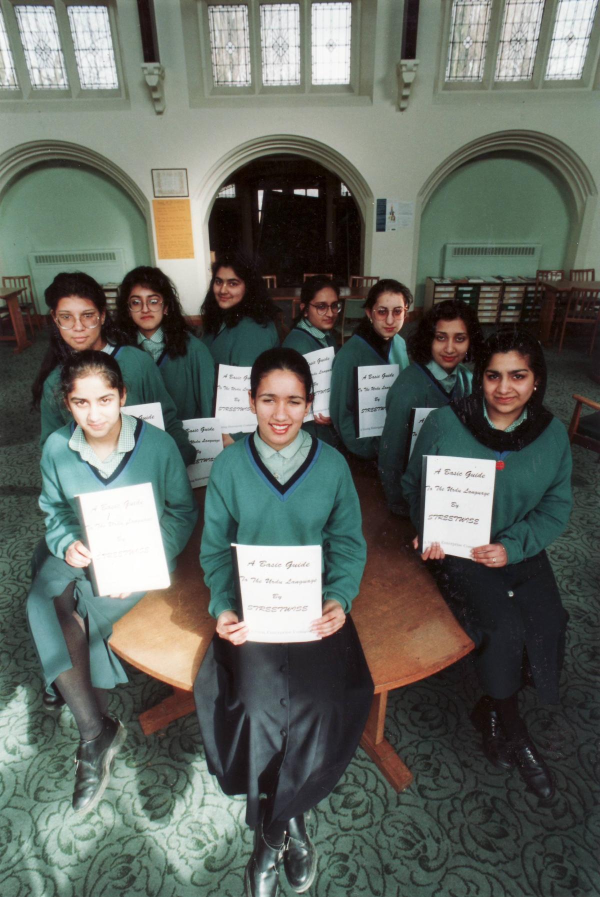 St Joseph's College pupils with translation booklets in 1994