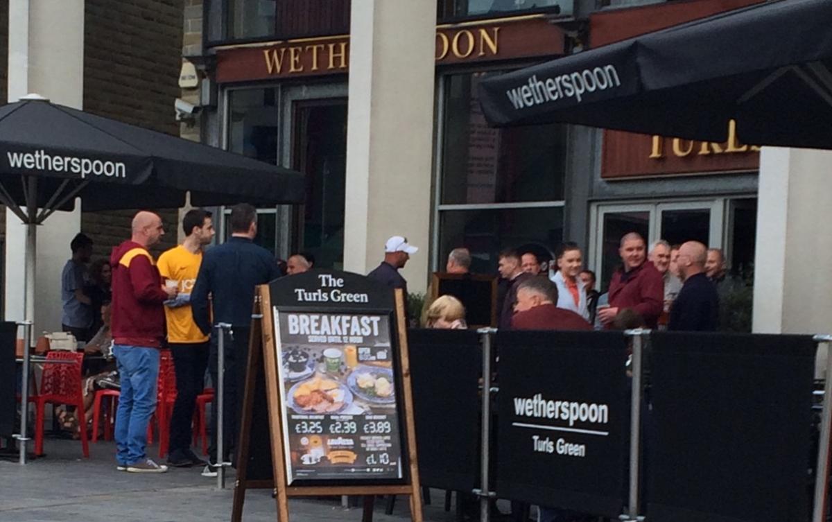 City fans gather at Wetherspoons for an early morning pint