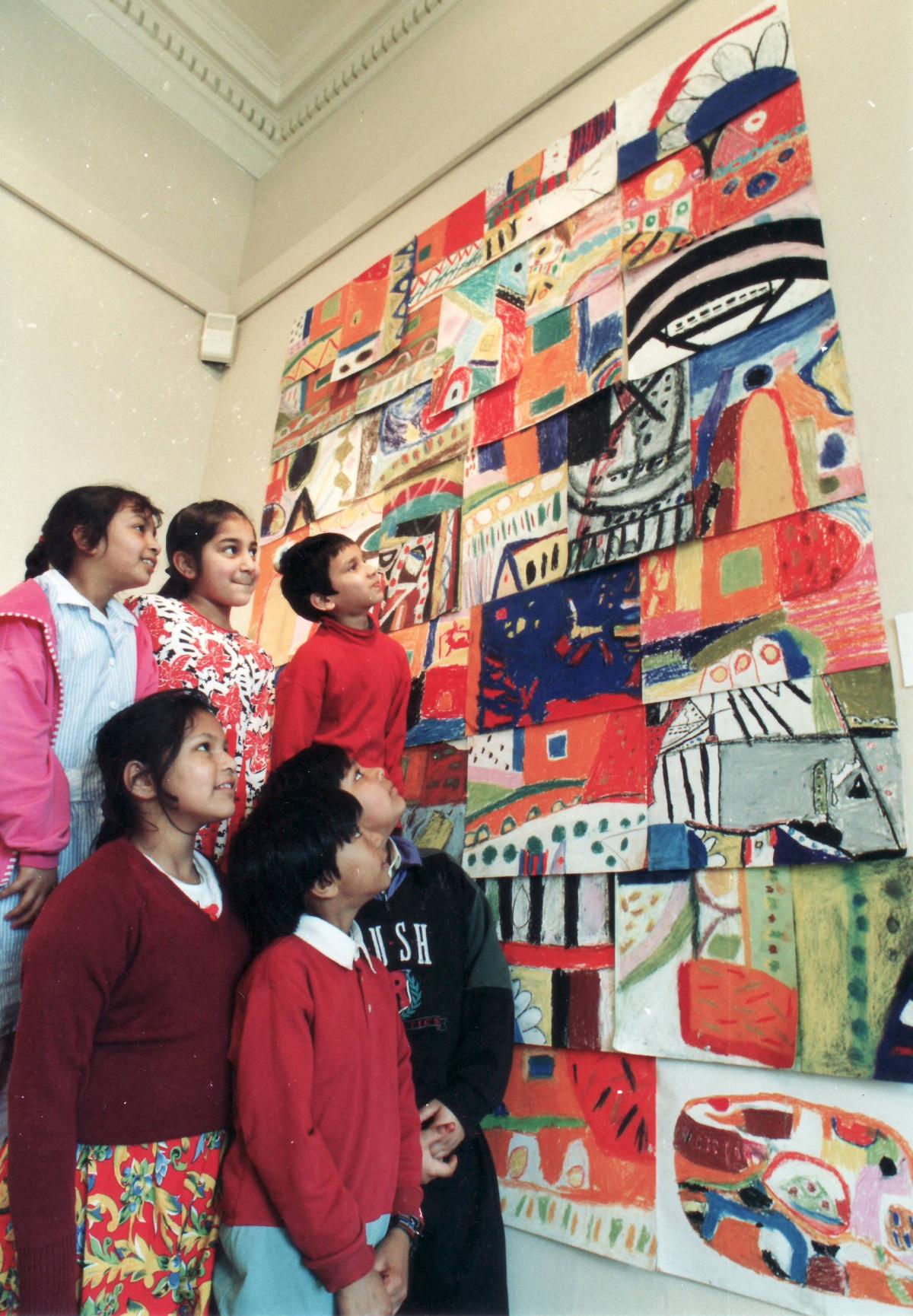 Belle Vue First pupils admire artwork in 1994