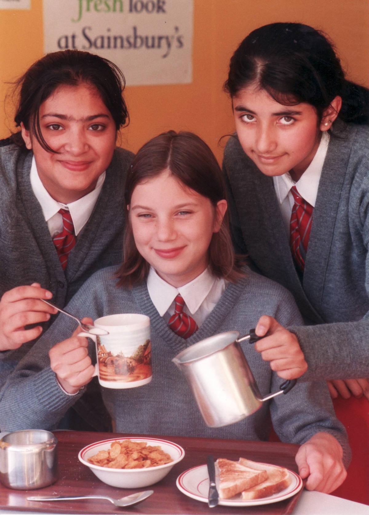 Girls enjoy breakfast in 1997