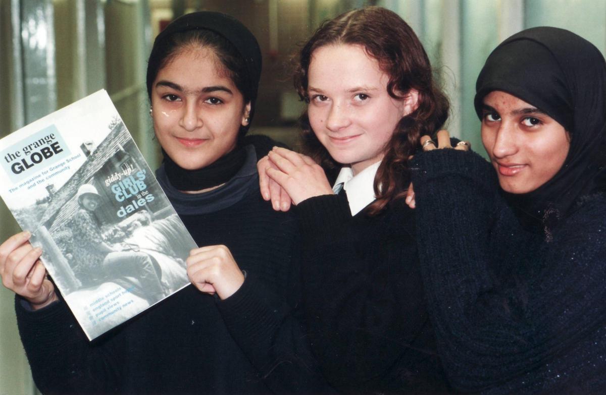 Grange upper school pupils with a copy of the Grange Globe 1996
