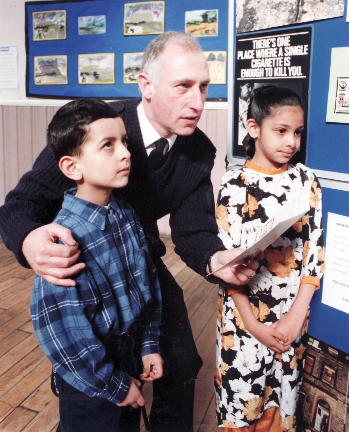A ire officer giving talk at Grange First School 1995