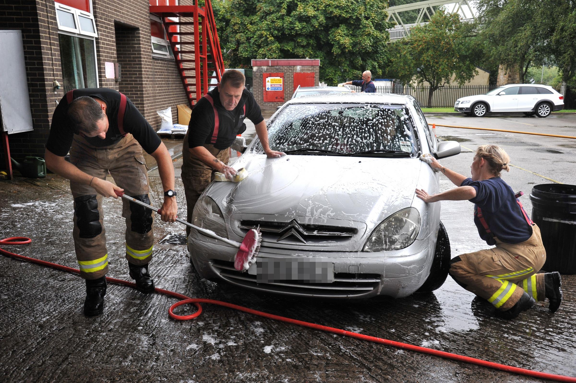 Firefighters offer popular car wash event in aid of Firefighters Charity