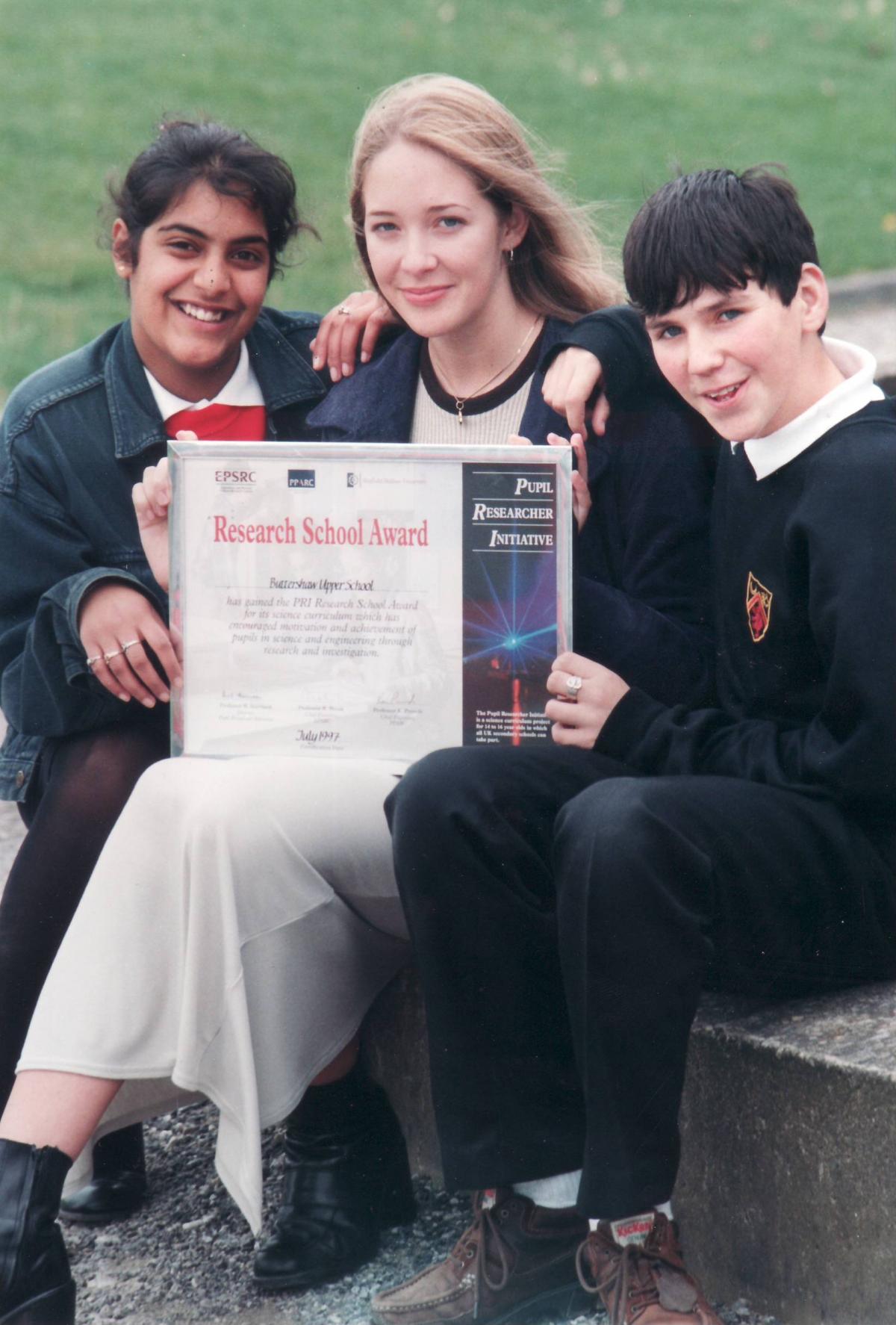 Pupils celebrate an award in 1997
