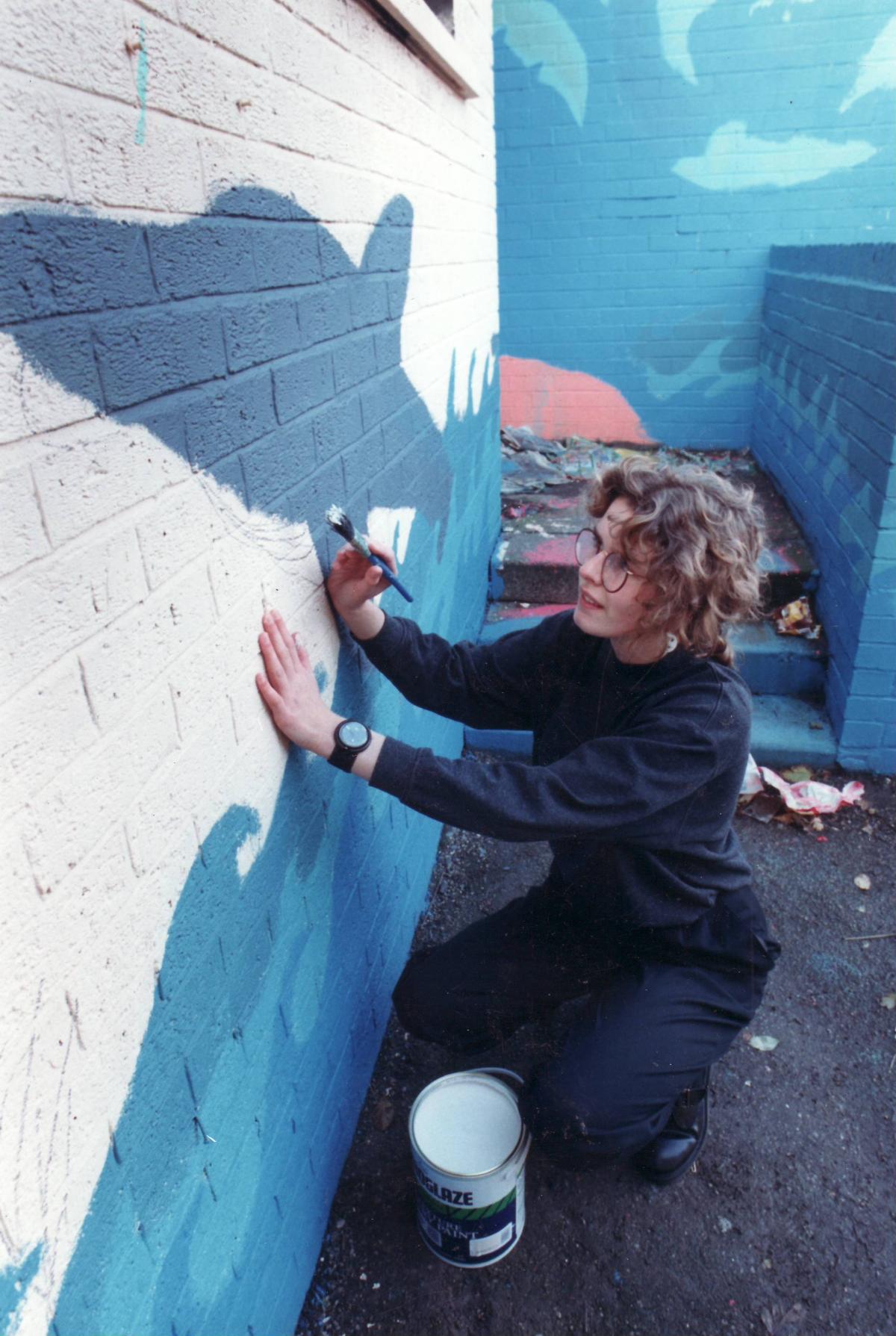 Painting school walls in 1991