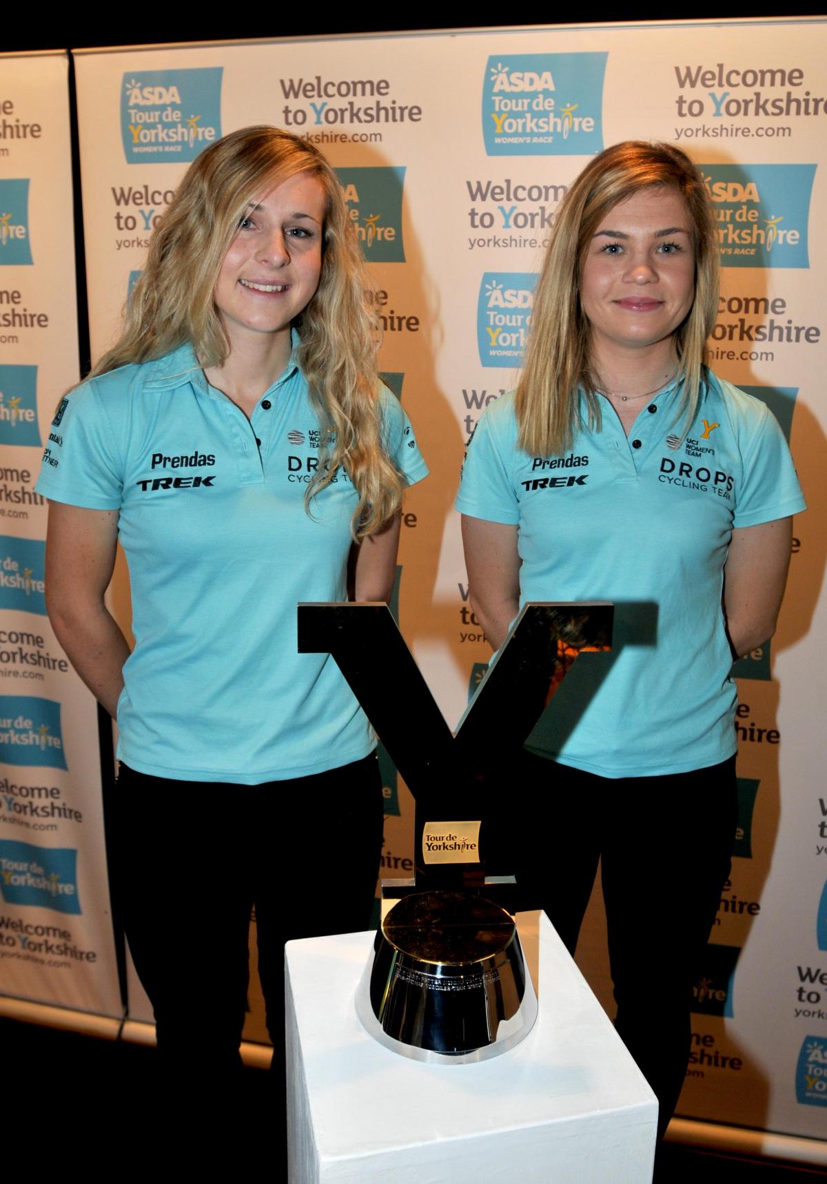 Cyclists Annie Simpson and Becky Womersley  with the Tour De Yorkshire trophy
