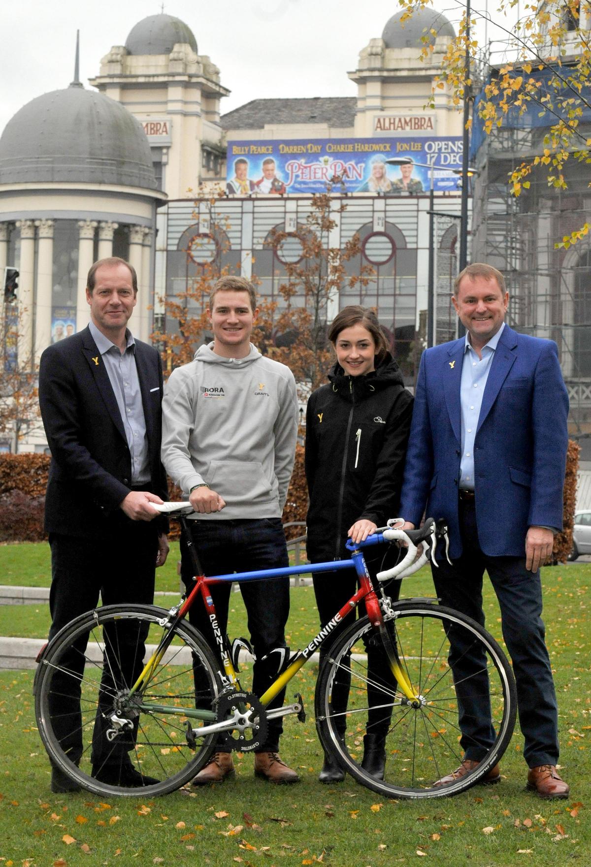 Tour de France Director Christian Prudhomme with pro cyclists Scott Thwaites and Grace Garner, and Welcome to Yorkshire chief executive Gary Verity outside the Alhambra in Bradford