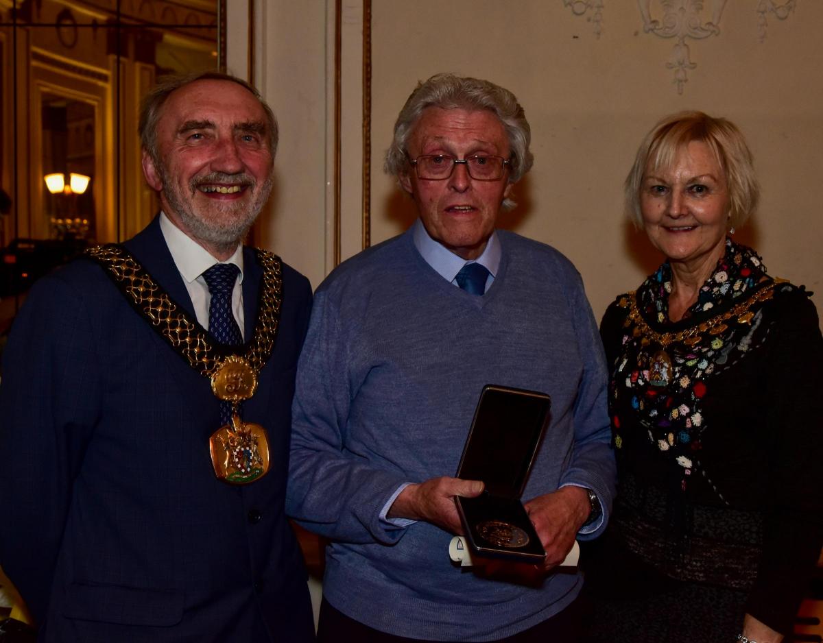 Volunteer award winner Christopher McDermott with Lord Mayor Geoff Reid and Lady Mayoress Chris Reid