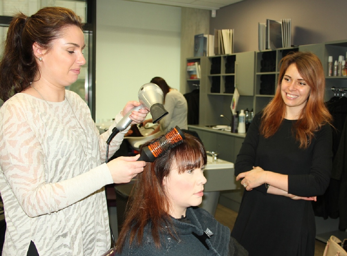 Salon owners from across city return to college for training
