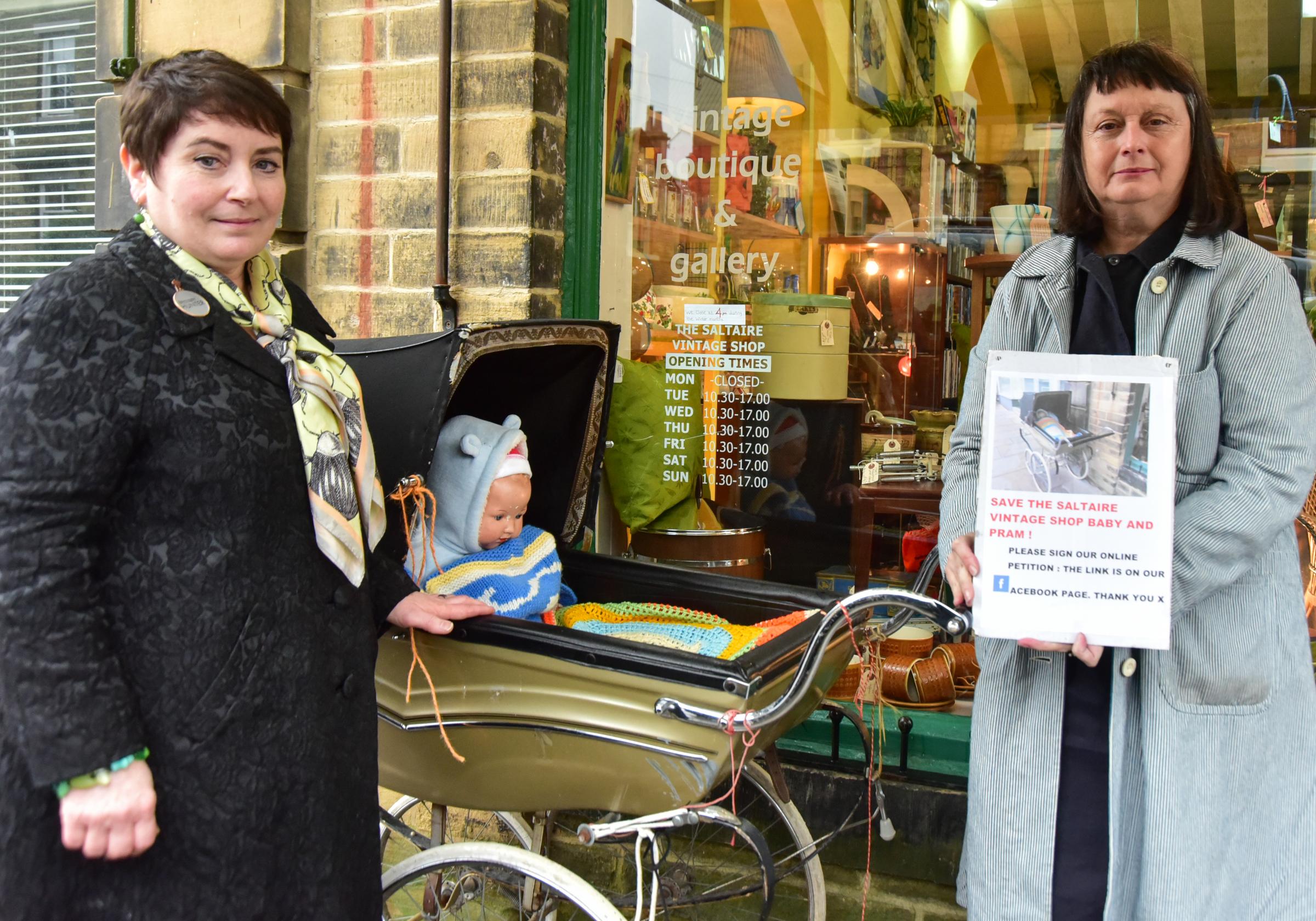 Shop owners told vintage pram display is causing an obstruction and has to go
