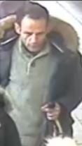 Police issue picture appeal after glass panel smashed at bus station