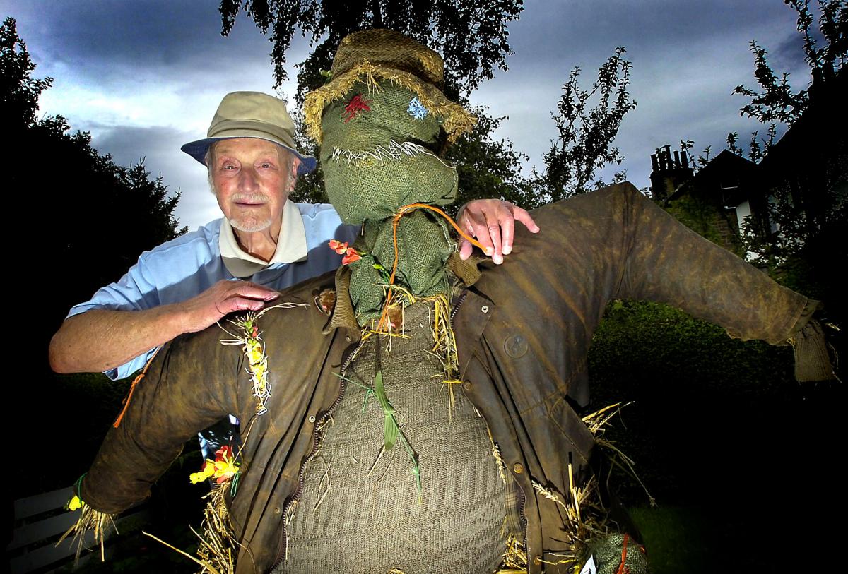 Ron Bairstow with one of the scarecrows