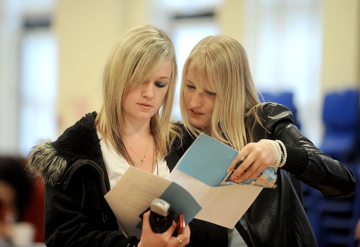 Lucy Smail and Laura Dawson look at their results at Bingley Grammar School