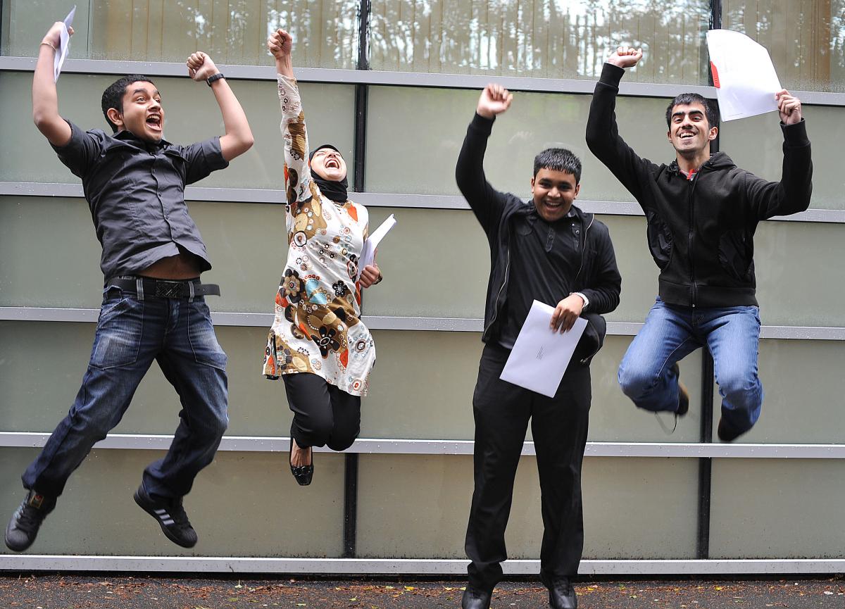 Amran Ali, Aina Khan, Masoom Miah and Tahir Mahmood jump for joy at Challenge College