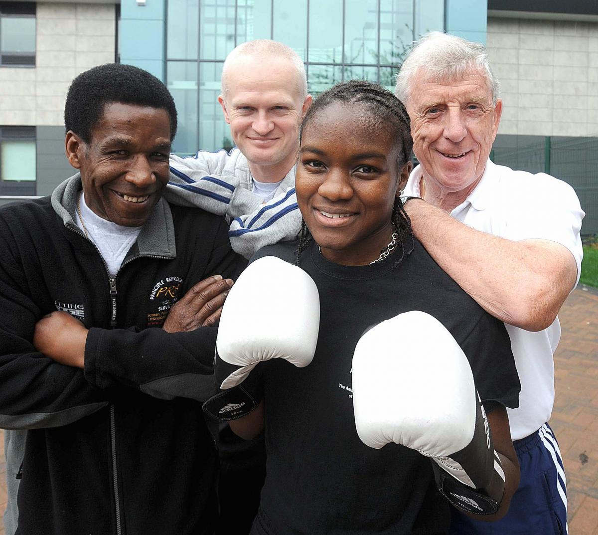 Julian Cyprien, Paul Porter, Nicola Adams, and Academy Coach Alwyn Belcher outside Bradford College where the new boxing academy will be based