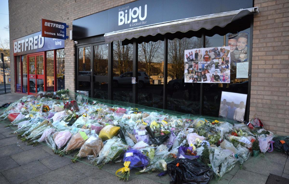 DECEMBER Floral tributes to James Etherington outside Bijou nightclub in Bingley