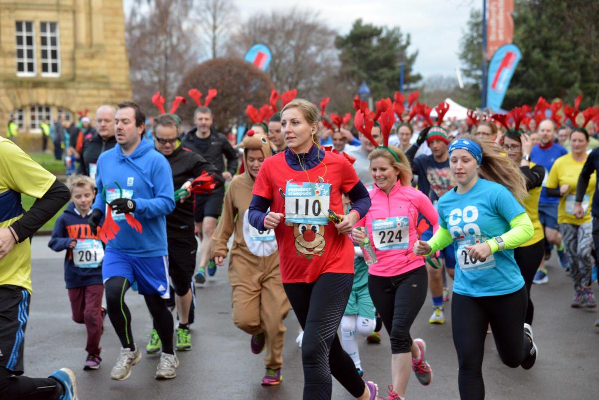 DECEMBER Runners filing through Lister Park at this year’s Epilepsy Action Reindeer Stampede