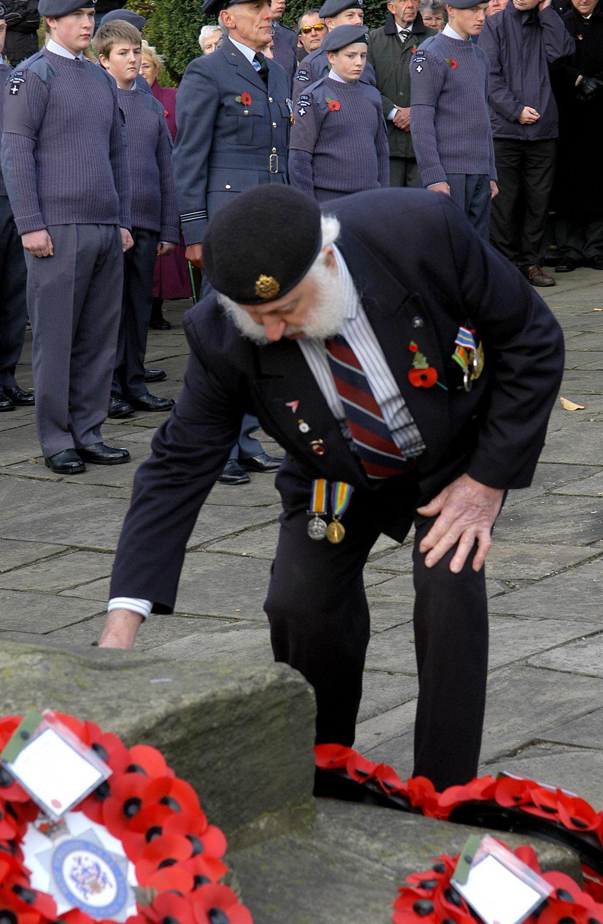 Frank Riley lays a wreath during the Remembrance Day parade at Guiseley