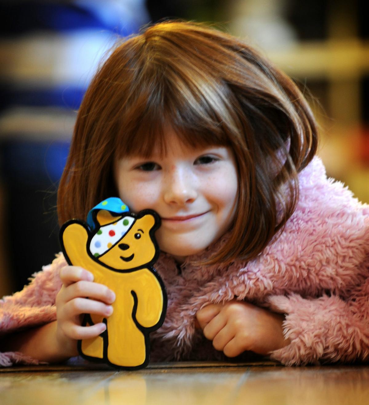 Amelia Milner, six, with her Pudsey.