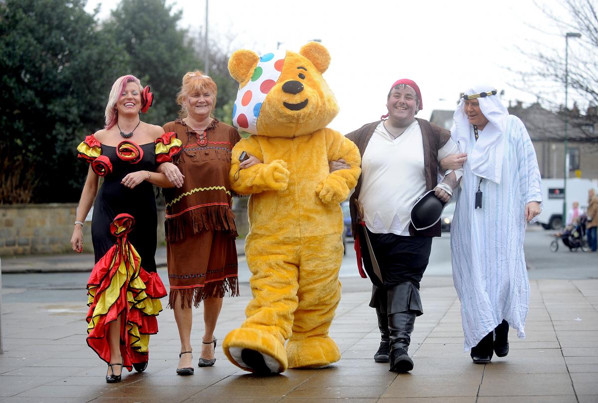 Pictured with Pudsey Bear are, from the left, Jane Lovell, Pauline Toulmin, Ben Whitney and Jane Keiss