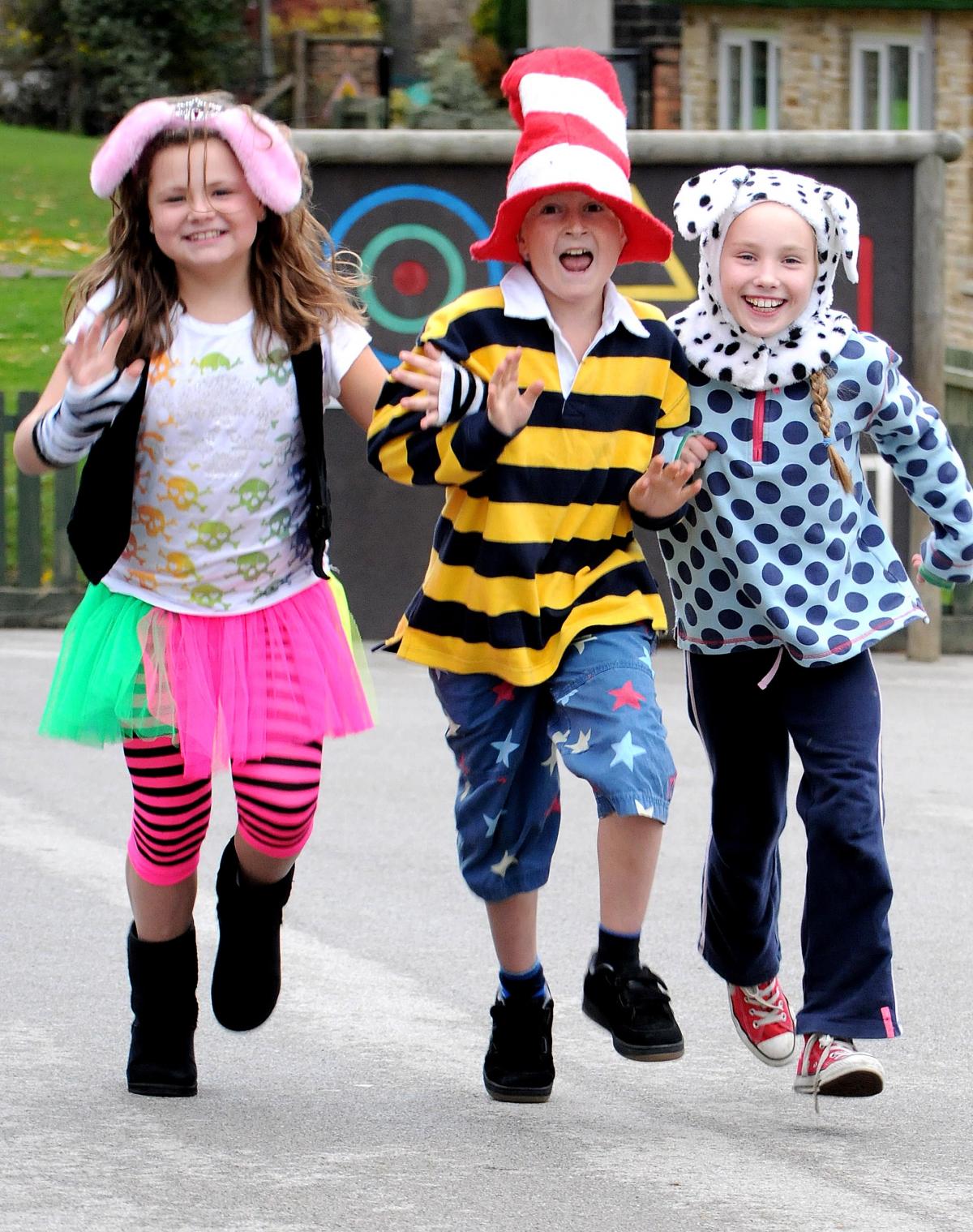 Ashlands Primary School, Ilkley, pupils donned fancy dress for Children in Need. Pictured here are, from the left, Ellie Phillips, 11, Dudley Spence,