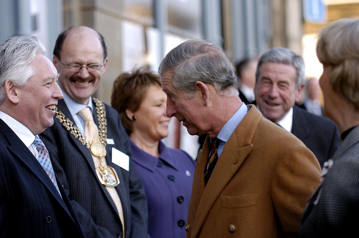 Prince Charles meets local dignitaries at the start of his v isit